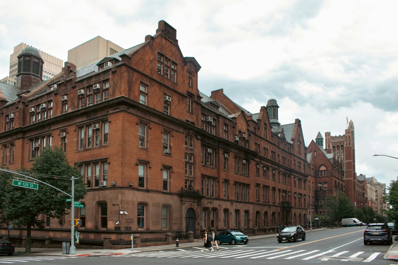 A city street with cars parked on the side of it